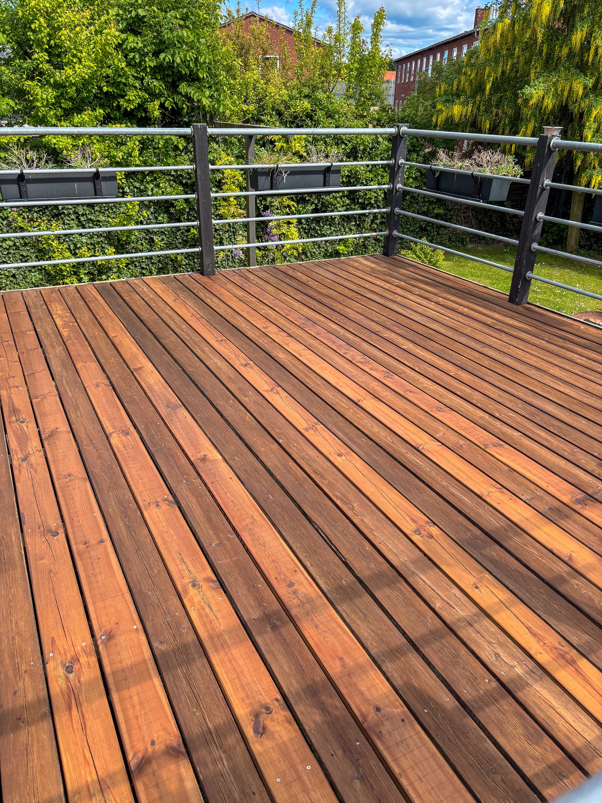 Billede af en renset træterrasse i Rødovre